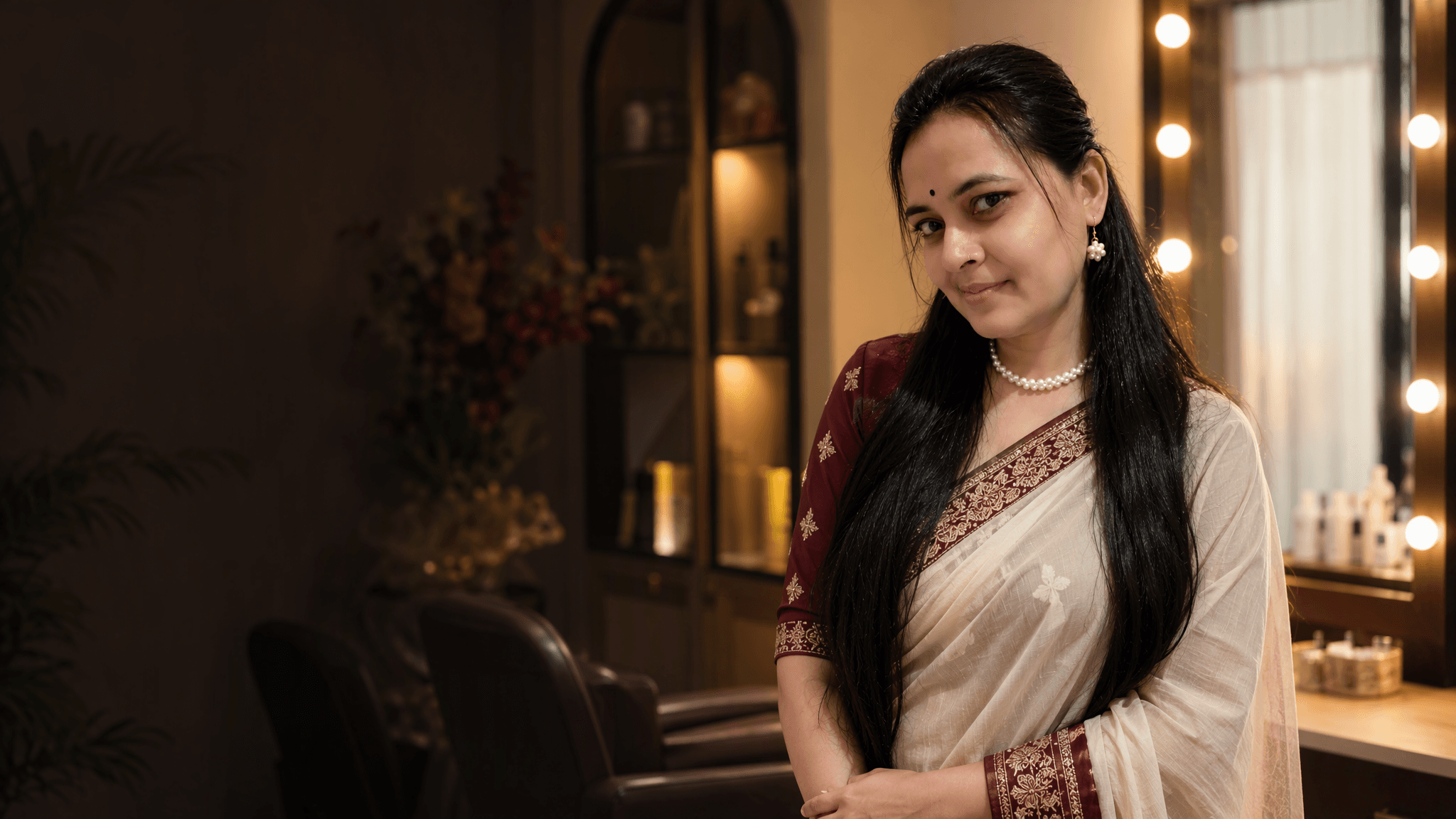 Surbhi welcoming clients to her beauty parlour in Rohtak